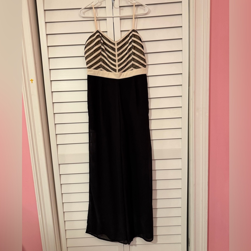 Elegant Black and Cream Striped Jumpsuit